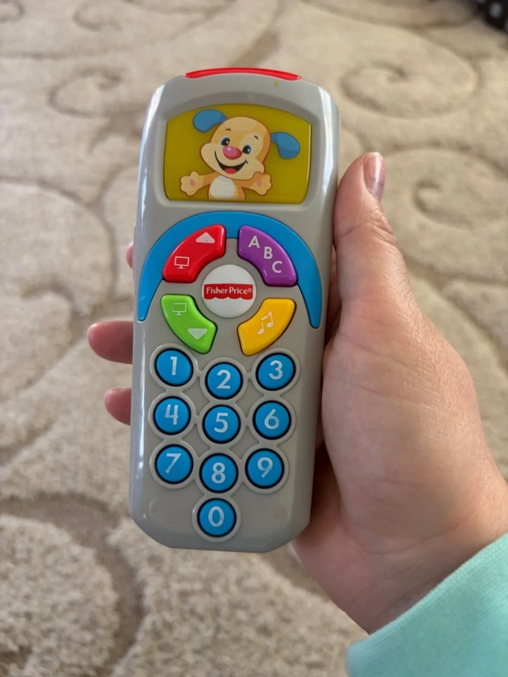 Fisher-Price Laugh & Learn Puppy’s Remote Learning Toy with Music and Lights
